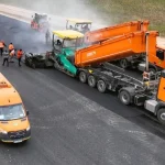 A7 prinde contur la Roman-Sud. UMB asfaltează bretelele și montează grinzi la pasaj